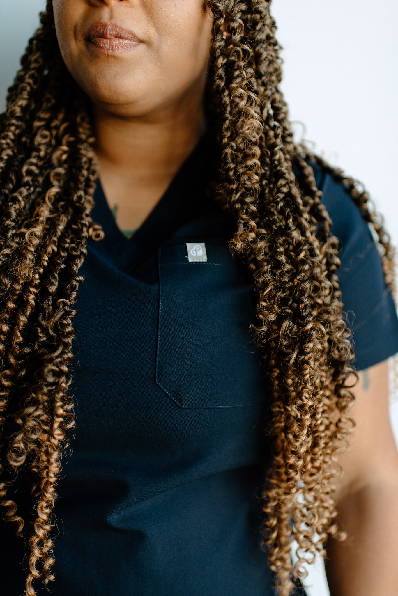 Isla One-Pocket Scrub Top in Code Navy Blue